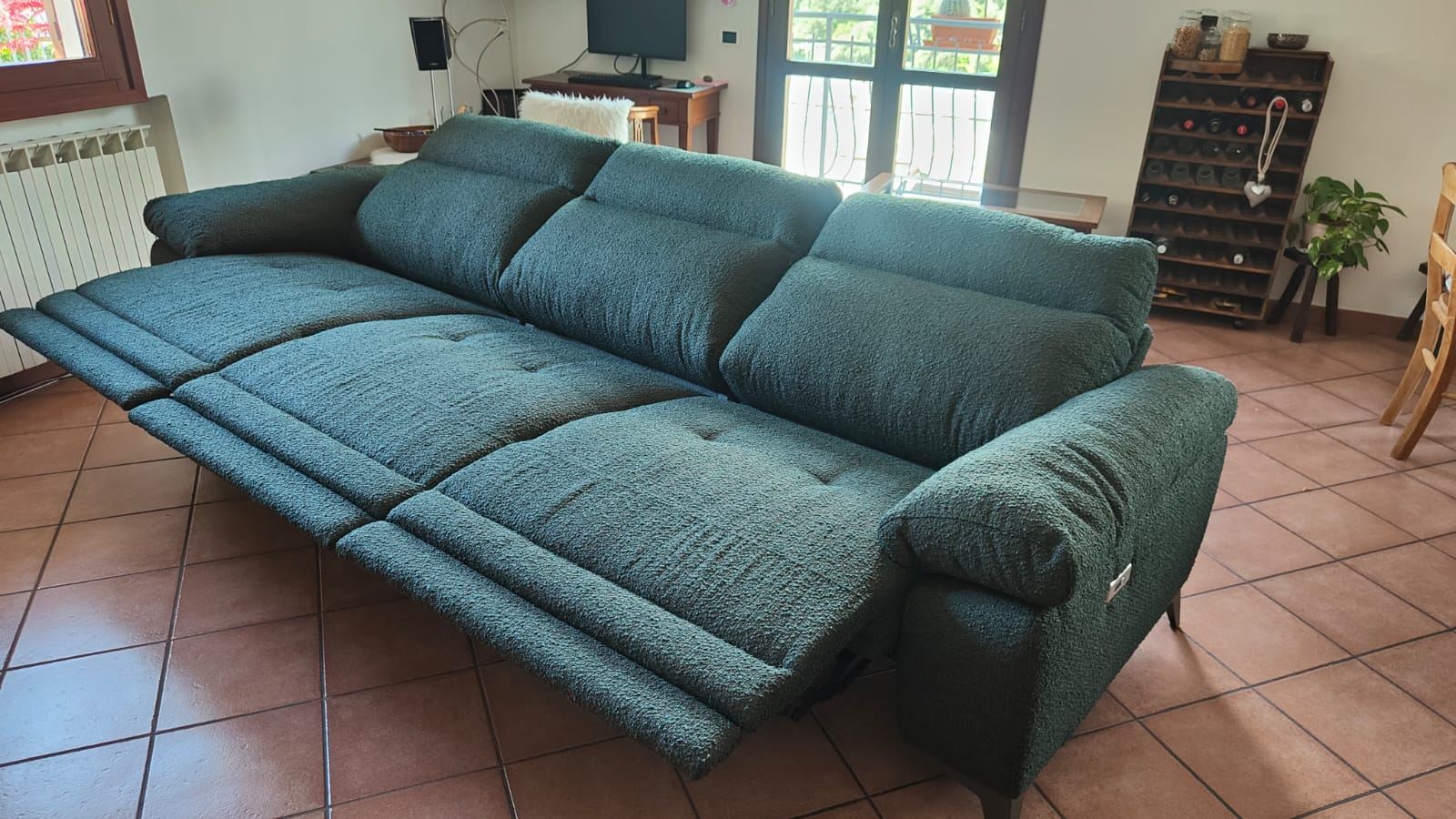 Divano verde scuro
